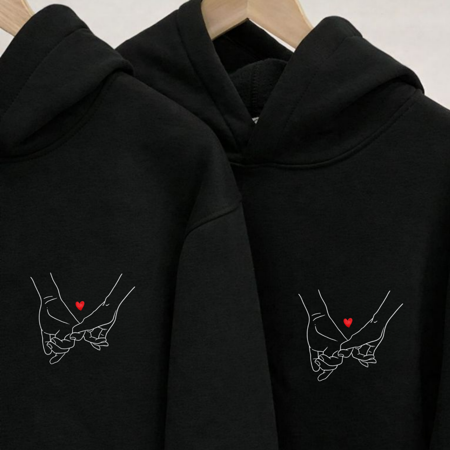Matching Black couple's hoodie with "Still Choosing You Every Day" pinky promise heart design on left chest - Valentine's Day gift
